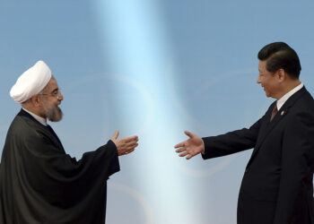 Хасан Рухани и Си Цзиньпин. Иллюстрация: rt.com