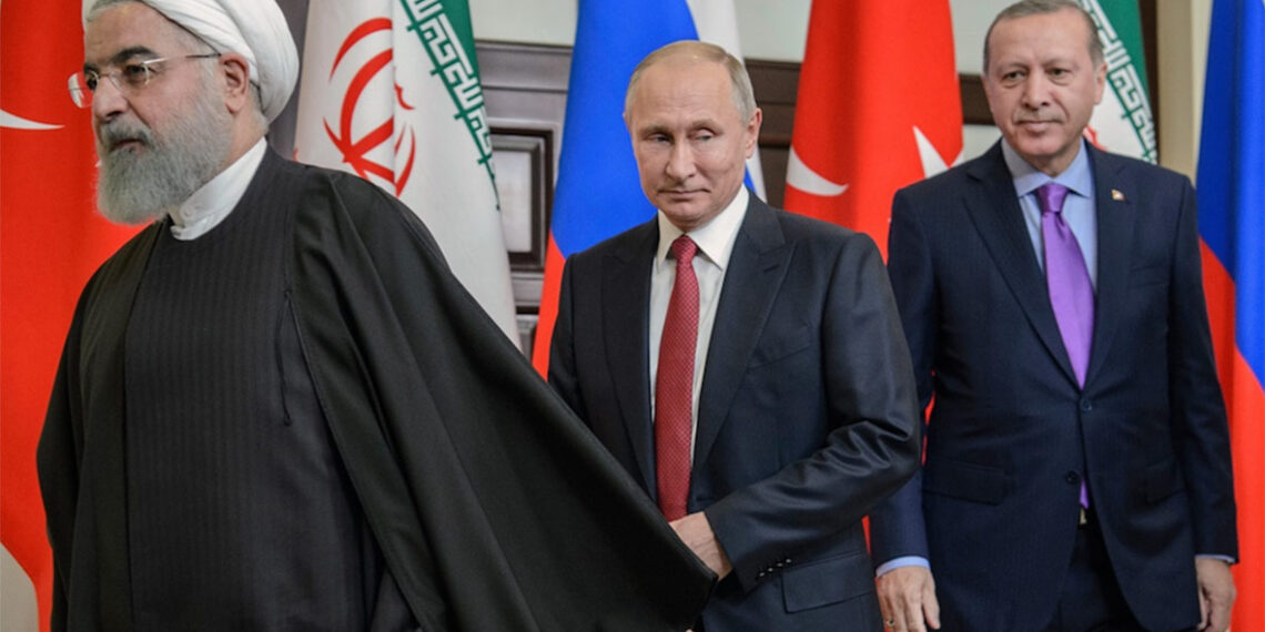 Хасан Рухани, Владимир Путин и Хасан Рухани. Фото: Дмитрий Азаров / «Коммерсант»