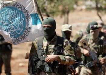 Боевики "Хайят Тахрир аш-Шам"* на тренировочной базе в провинции Идлиб, Сирия. Фото: AFP