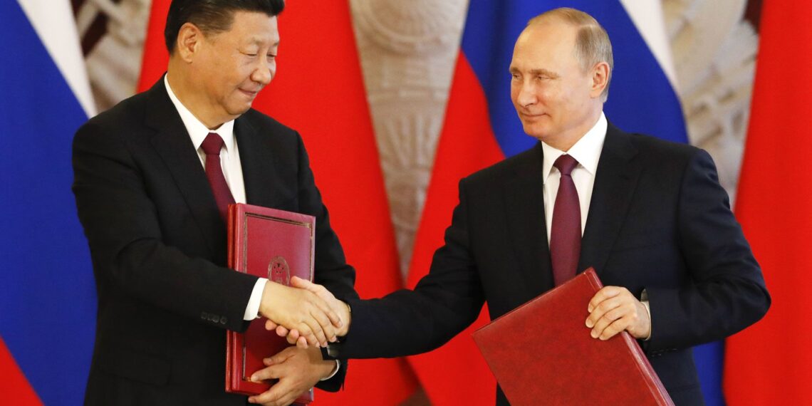 Владимир Путин и Си Цзиньпин. Фото: CNBC