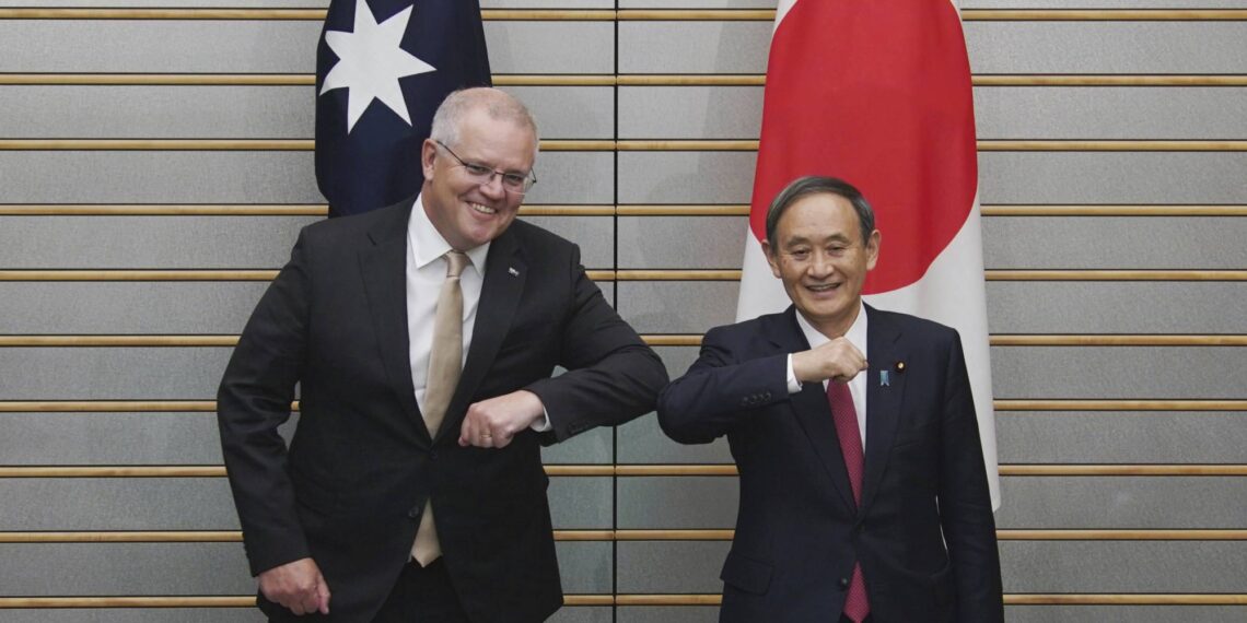 Скотт Моррисон и Ёсихиде Суга. Фото: AP