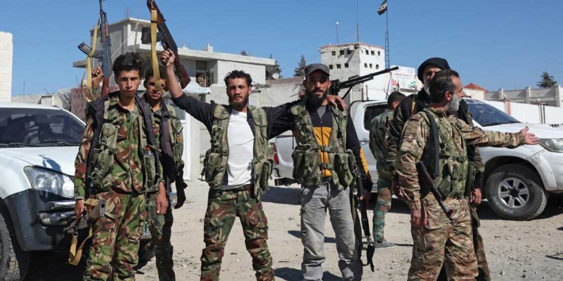 Террористы у КПП Кафр-Джанна на окраине сирийского города Африн. Фото: AFP