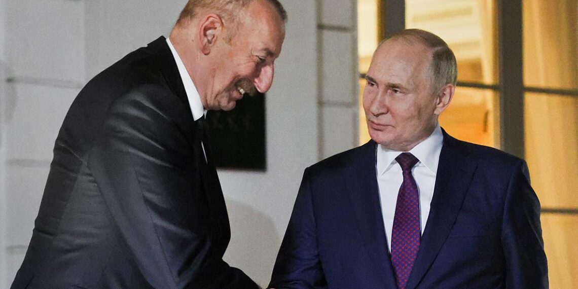 Ильхам Алиев и Владимир Путин. Фото: Сергей Бобылев / ТАСС