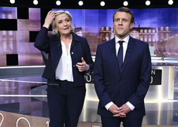 Марин Ле Пен и Эммануэль Макрон. Фото: AFP