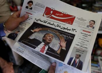 Иранская газета. Фото: Atta Kenare/AFP/Getty Images