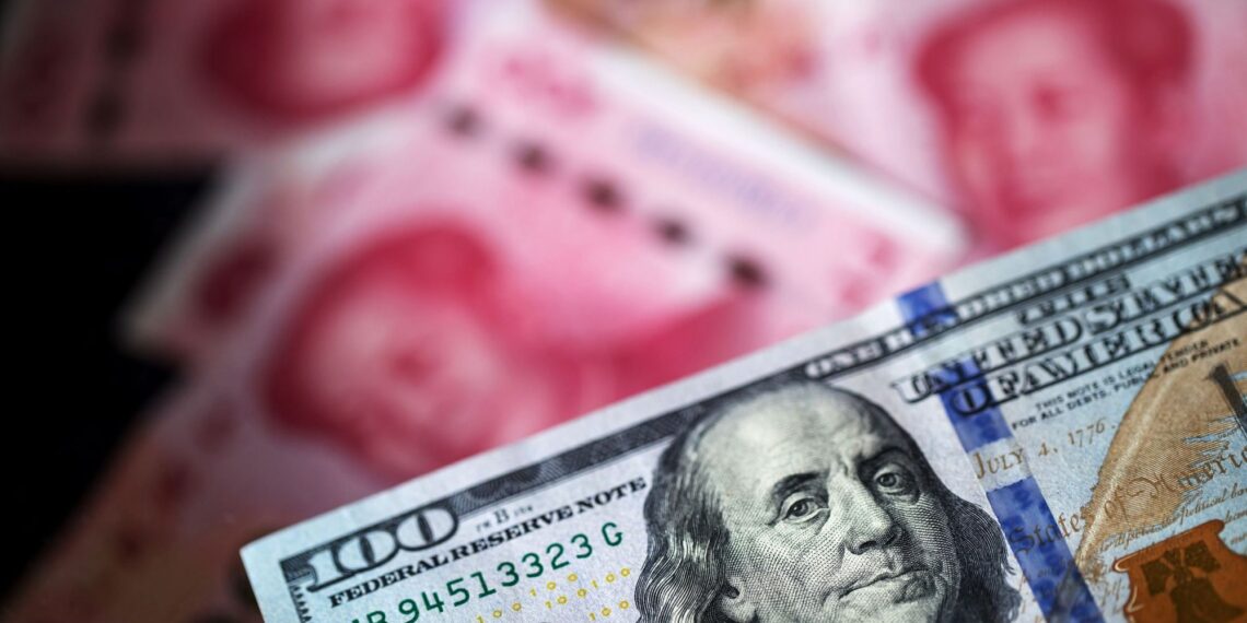 Юань на долларе. Фото: bloombergquint.com