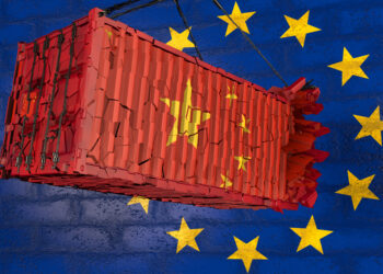 destroyed container with the flag of China after the collision with the wall symbolizing the European Union's customs barrier