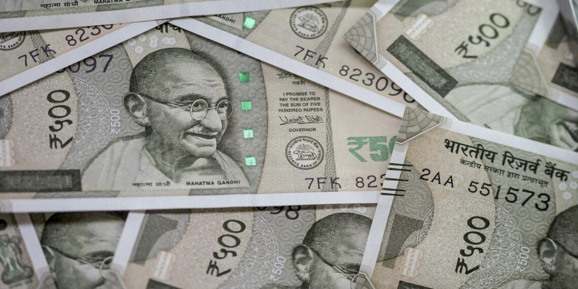 Indian five hundred rupee banknotes are arranged for a photograph in Mumbai, India. Photographer: Dhiraj Singh/Bloomberg