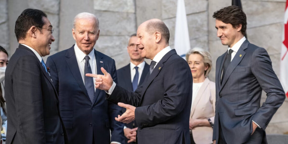 Фумио Кисида (слева) уже последовал примеру Джо Байдена (второй слева). Поступят ли также Олаф Шольц (третий слева) и Джастин Трюдо (справа)?